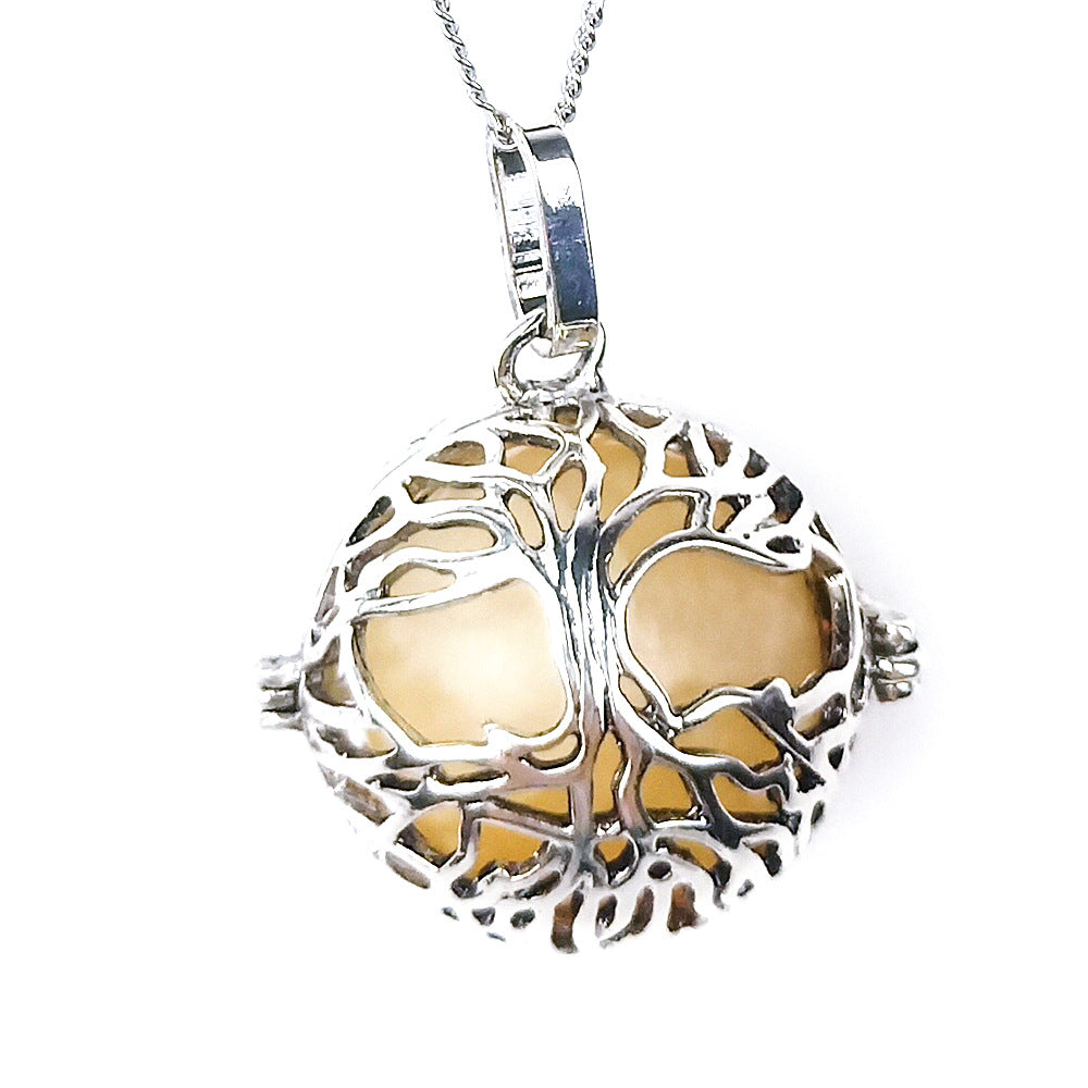 Round Tree Of Life Caged Crystal Pendant