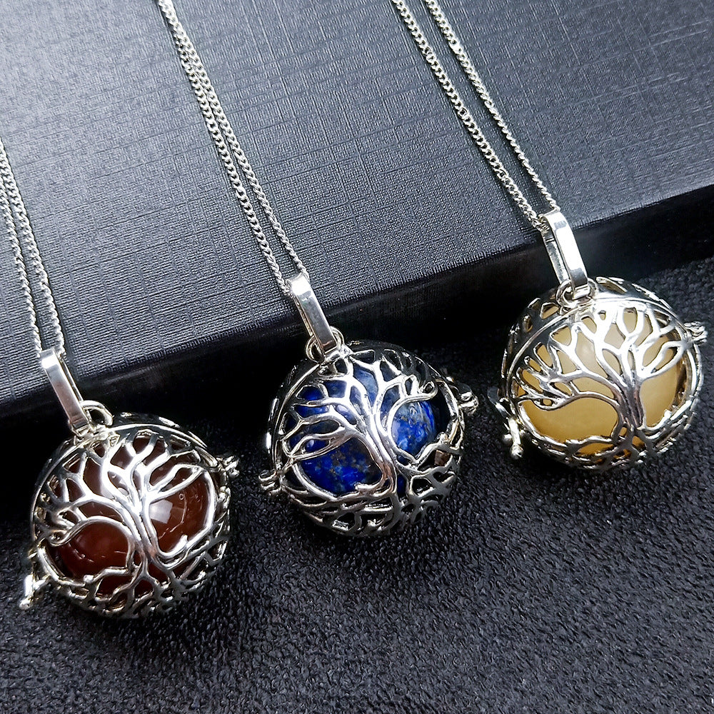 Round Tree Of Life Caged Crystal Pendant