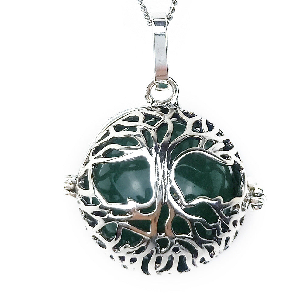 Round Tree Of Life Caged Crystal Pendant