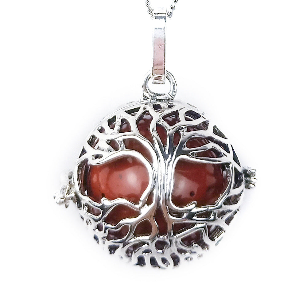 Round Tree Of Life Caged Crystal Pendant