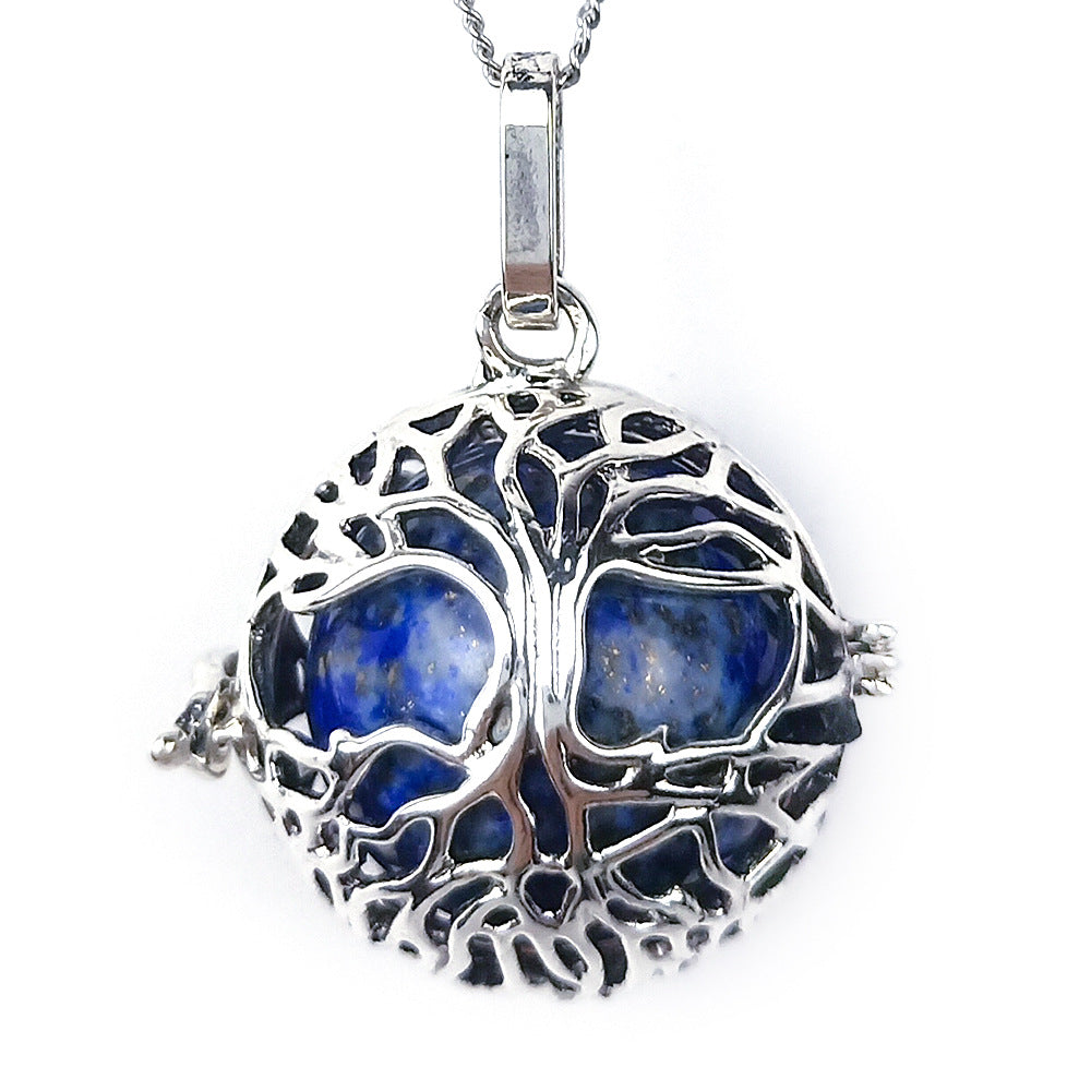 Round Tree Of Life Caged Crystal Pendant