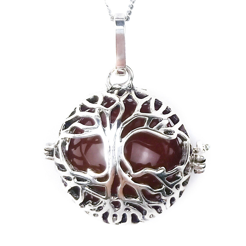 Round Tree Of Life Caged Crystal Pendant